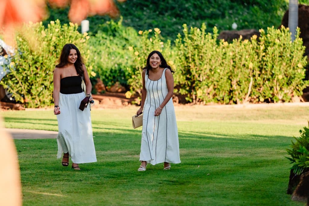 Tithi walking towards Pruthvi and smiling in complete shock. Her sister walking next to her and smiling.